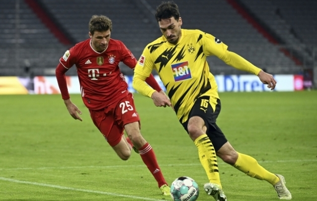 Thomas Müller (Müncheni Bayern) ja Mads Hummels (Dortmundi Borussia). Foto: Scanpix / Sven Hoppe / Pool via AP