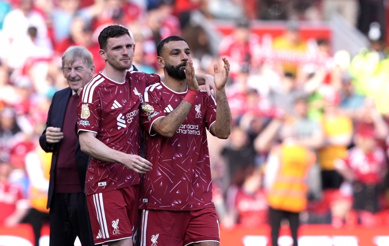 Andy Robertson ja Mohamed Salah lahkusid Liverpoolist. Foto: Scanpix / Peter Byrne / PA Wire / PA Images